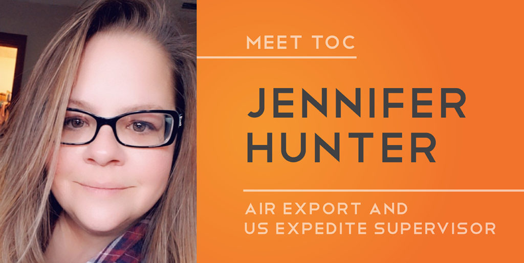Jennifer Hunter smiles at the camera while text reads, "Meet TOC Jennifer Hunter, Air Export and U.S. Expedite Supervisor."